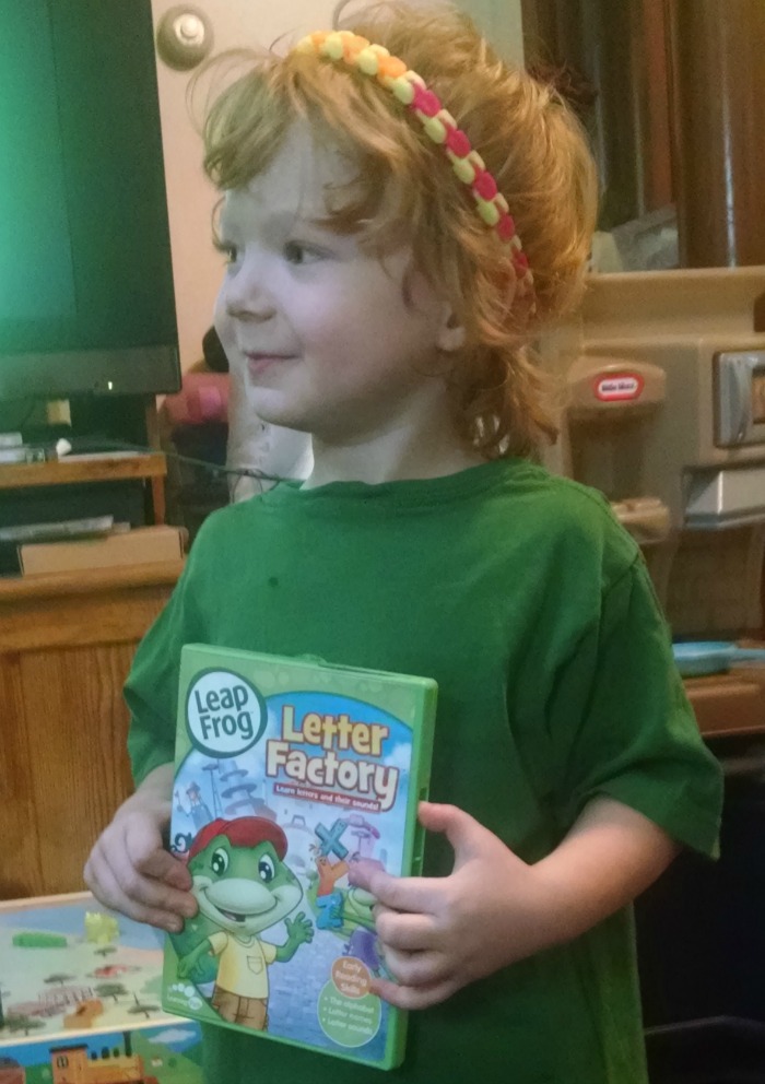 Lil' Red holding Letter Factory Dvd