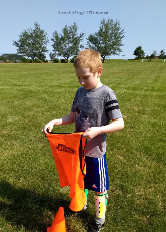 Soccer Camp boy with penny